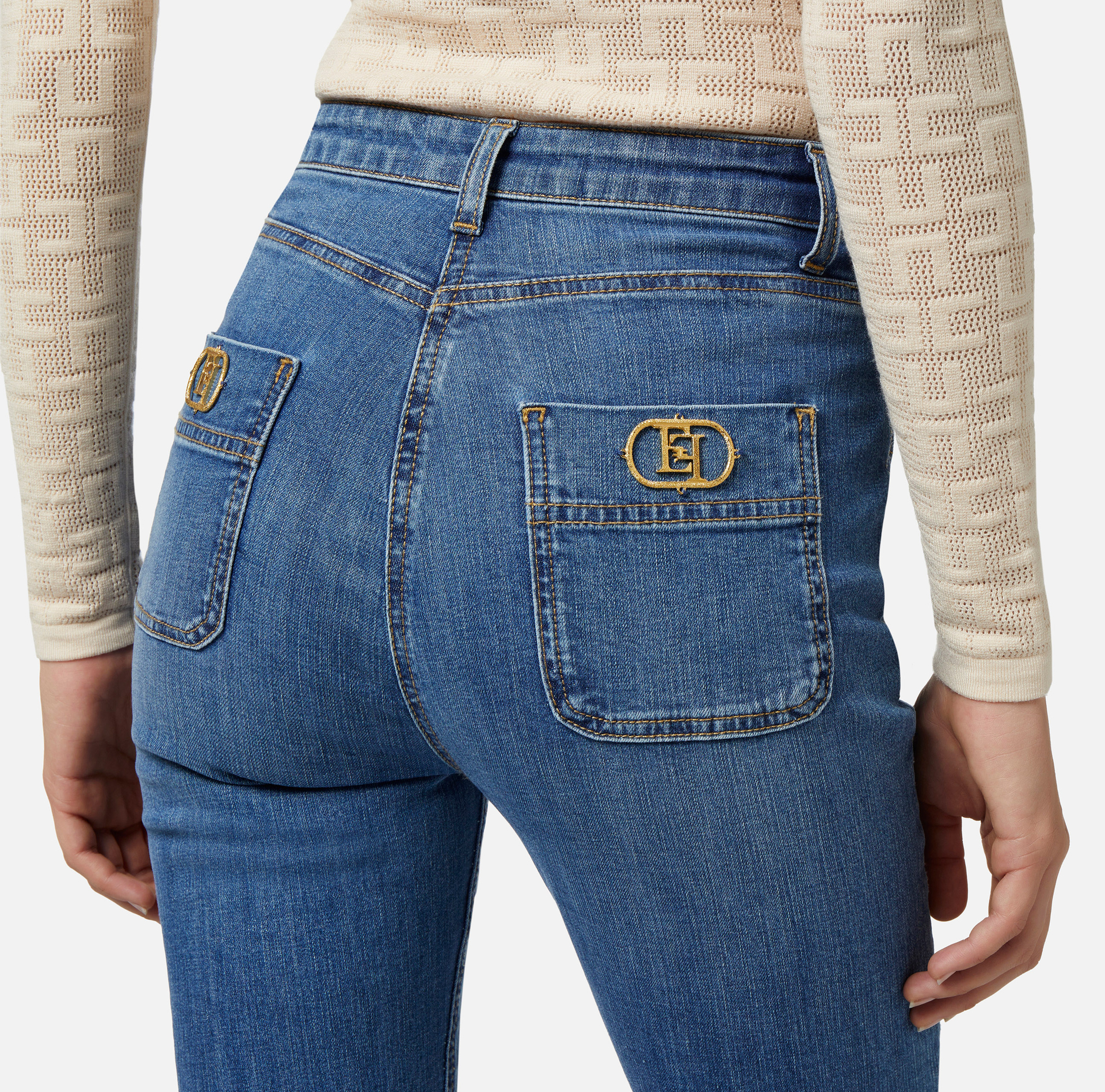Boot-cut jeans with logo plaque - Elisabetta Franchi® Outlet